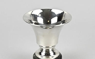 Silver chalice on marble base
