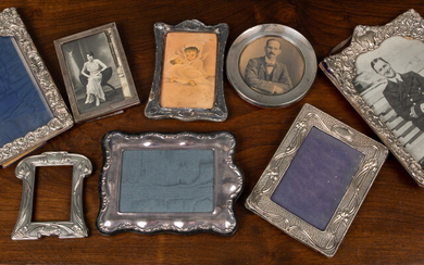Six silver embossed photoframes