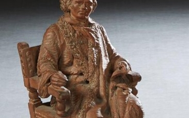 Terracotta Figure, 19th c., of a gentleman seated in an