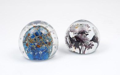 Two paperweights of modern design, the former with blue and...