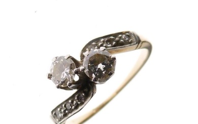 Unmarked yellow metal and diamond dress ring of crossover...