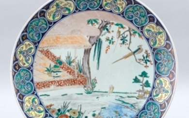 IMARI PORCELAIN CHARGER With bird and flower garden design surrounded by stylized fungus. Diameter 17.5".