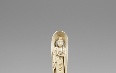 An ivory okimono of a Buddha. Late 19th century