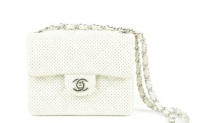 CHANEL - a Mini Perforated Single Flap handbag. View more details