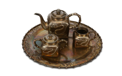 A CHINESE FOUR-PIECE EXPORT SILVER TEA SET. Late...