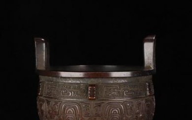 A COPPER CENSER WITH BEATS CARVED