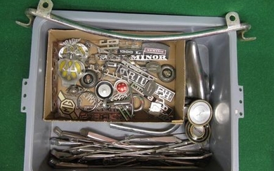 Crate of chromed items, wiper arms, large badge bar, car badges, horn pushes etc