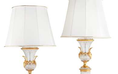 A pair of cut glass and gilt bronze mounted lampbases