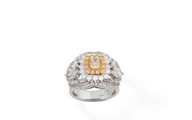A diamond and coloured diamond dress ring