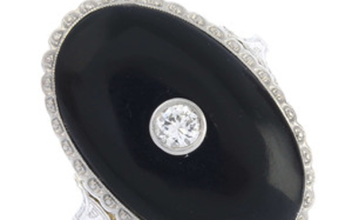 A diamond and onyx ring.
