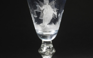 An engraved baluster Justice wine glass, circa 1720-30