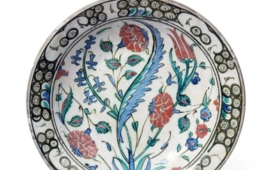 An Isnik Pottery Dish, circa 1620, typically painted in blue,...