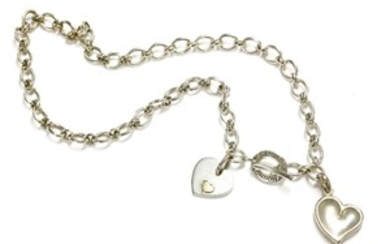 A Links of London sterling silver oval link chain necklace, with two heart shaped charms, marked ...