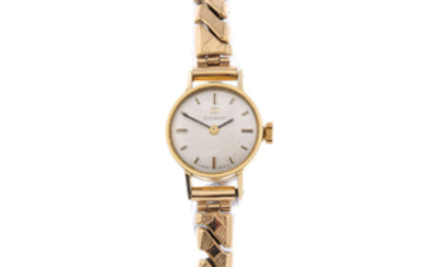 TISSOT - a lady's 9ct yellow gold bracelet watch. View more details