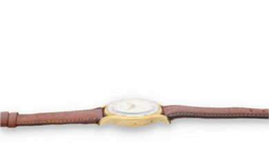Tissot. A Yellow Gold Bumper Automatic Wristwatch