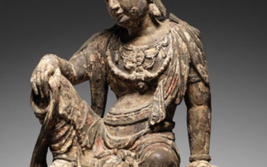 A very rare carved wood figure of Guanyin