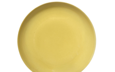 A YELLOW-GLAZED DISH, HONGZHI SIX-CHARACTER MARK IN UNDERGLAZE BLUE AND OF THE PERIOD (1488-1505)