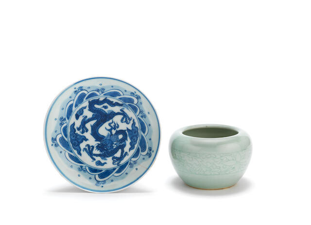A blue and white 'dragon' dish and a celadon-glazed bowl