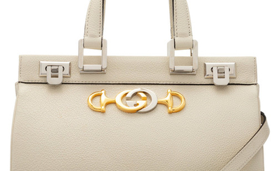 Gucci White Leather Small Zumi Bag Condition: 2 10.5"...