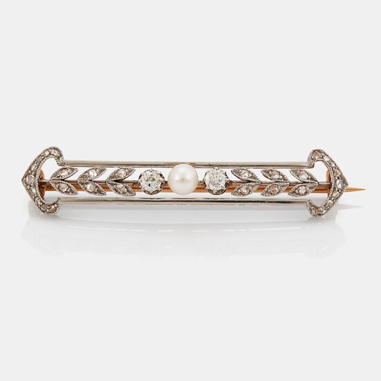 A 14K gold and platinum brooch set with a pearl and old- and rose-cut diamonds