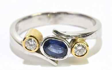 A 18ct white gold and yellow gold mounted sapphire and...