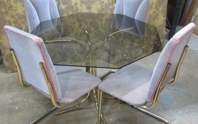 A 1980s dining room set comprising a table with smoke glass...