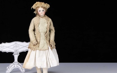 A 19th century French swivel head fashionable doll with jointed body