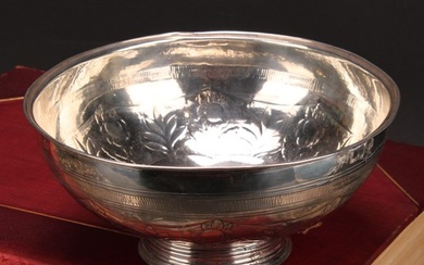 A 19th century Russian silver circular bowl, chased with an ...