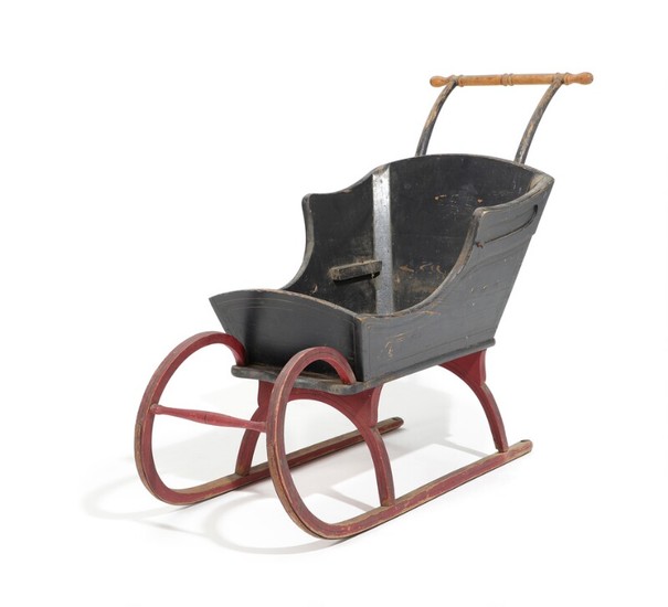 A 19th century painted wood and metal child's sleigh. H. 90. L. 115. W. 50 cm.