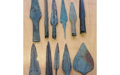 Ⓐ A WEST EUROPEAN BRONZE SPEARHEAD, 3000-1500 B.C. AND TEN FURTHER BRONZE WEAPONS