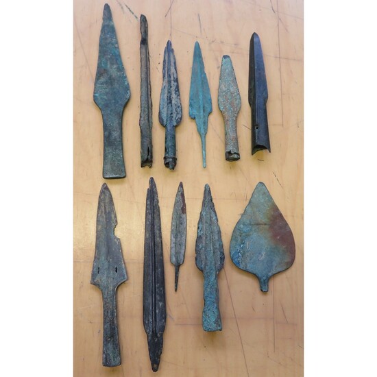 Ⓐ A WEST EUROPEAN BRONZE SPEARHEAD, 3000-1500 B.C. AND TEN FURTHER BRONZE WEAPONS