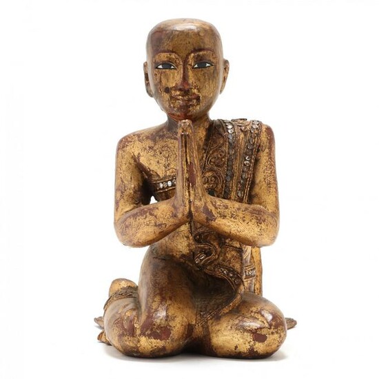 A Burmese Kneeling Gilt Wood Monk Sculpture