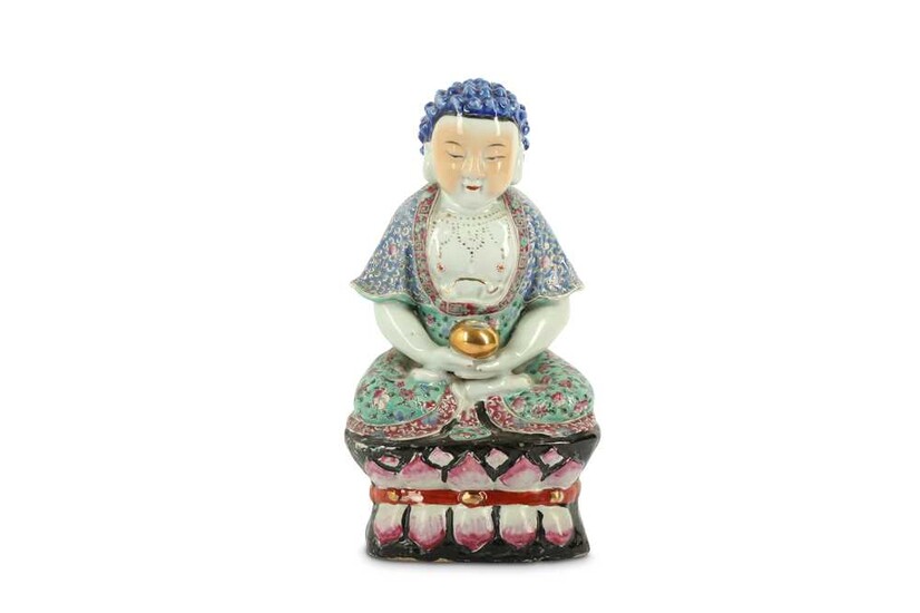 A CHINESE FAMILLE ROSE FIGURE OF A BUDDHA.