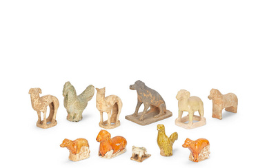 A COLLECTION OF ELEVEN GLAZED AND UNGLAZED POTTERY ANIMALS Han...