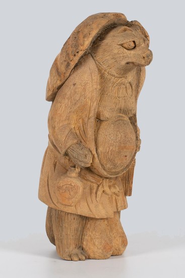 A Carved Bamboo Root Figurine of Tanuki, Japan.