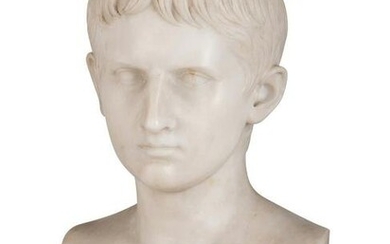 A Carved Marble Bust of a Young Man