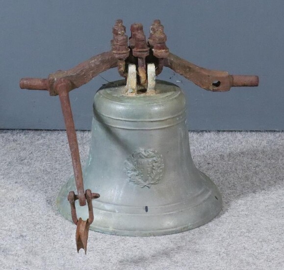 A Cast Brass Bell, with ornate crest to front...