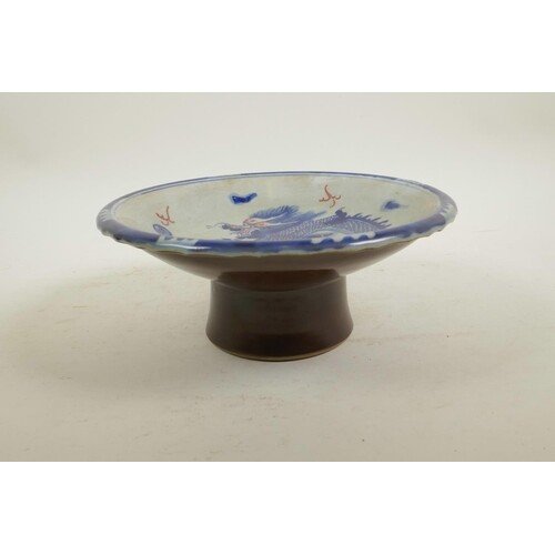 A Chinese blue and white porcelain stem bowl decorated with ...