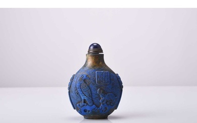 A Chinese carved lapis lazuli snuff bottle, Qianlong seal ma...