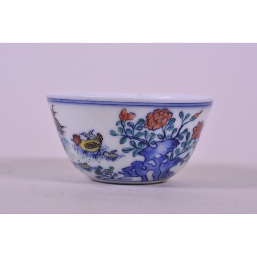 A Chinese doucai porcelain tea bowl with chicken decoration,...