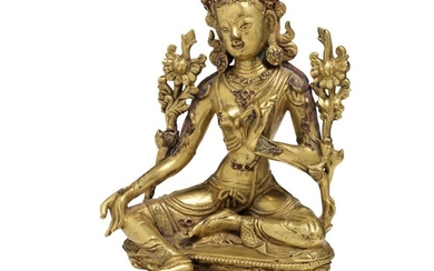 A Chinese gilt bronze figure of Green Tara. 18th century. Weight 1924 g. H. 18.5 cm.