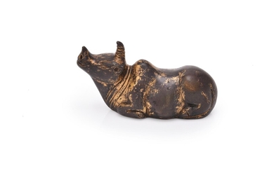 A Chinese gilt bronze paper weight of a rhinoceros