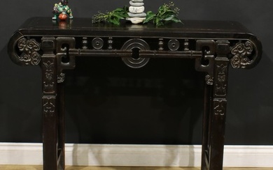 A Chinese hardwood altar table, rectangular top with scroll ...