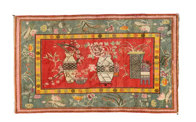 A Chinese rug Second quarter 20th century The central field with vase...