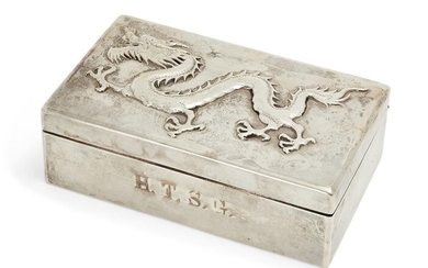 A Chinese silver cigarette box by Wang Hing, early 20th century, the cover decorated in relief with a dragon, marks to base, 13.5cm wide 二十世紀早期 王興製銀浮雕龍紋香煙盒