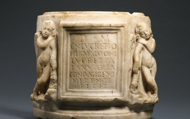 A FRAGMENTARY ROMAN MARBLE CINERARY URN, 1ST/2ND CENTURY A.D.