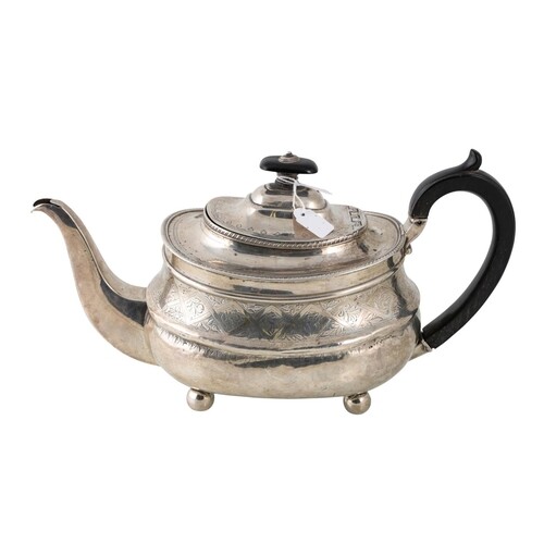 A GEORGE III SILVER TEAPOT OF LOAF OF BREAD FORM, chased and...