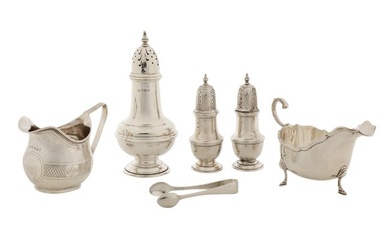 A George III sterling silver milk jug, London 1810 by John Merry