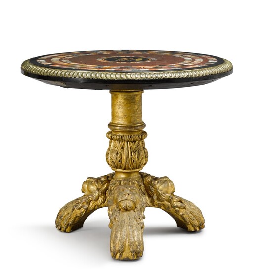 A George IV carved giltwood table with an Italian specimen marble top, first half 19th century