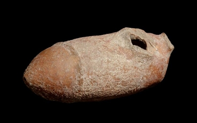 A Greek Terracotta Oil Lamp in the Form of a Phallus
